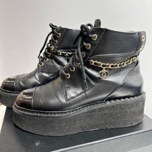 CHANEL Black Lace-Up Platform Boots with Gold Chain